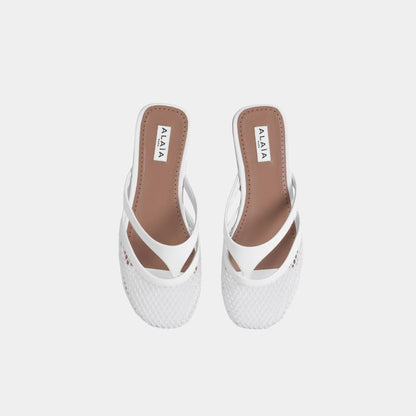 Infradito Flat Mules In Fishnet And Patent Leather