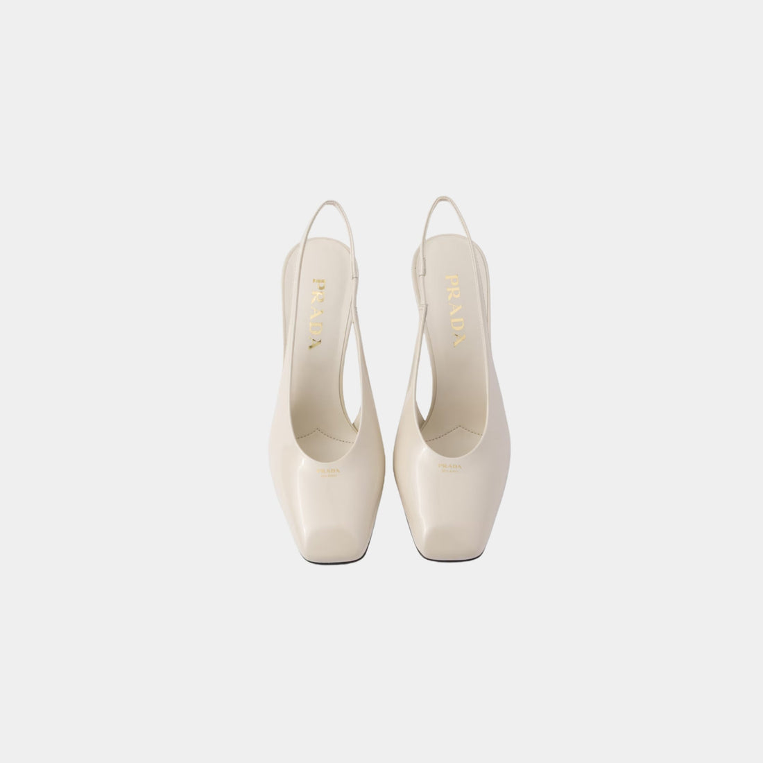 Patent Leather Slingback Pumps With Bound Leather Heel