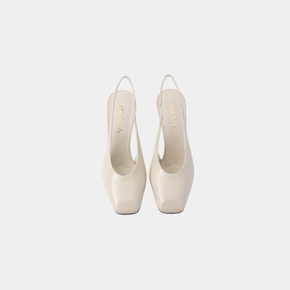 Patent Leather Slingback Pumps With Bound Leather Heel